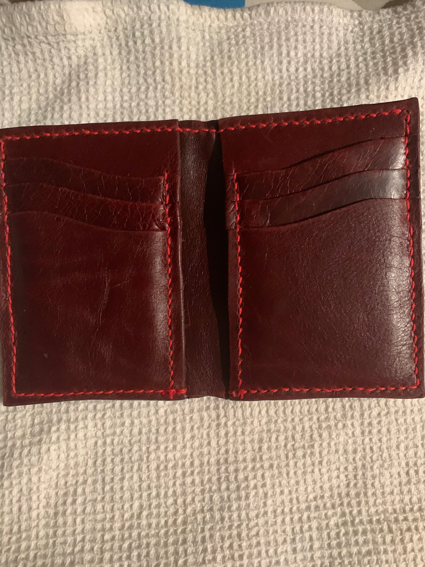 Dark red vertical leather wallet