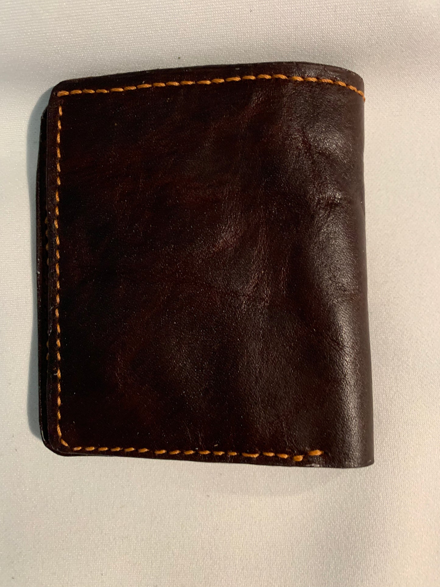 Dark brown bifold leather wallet
