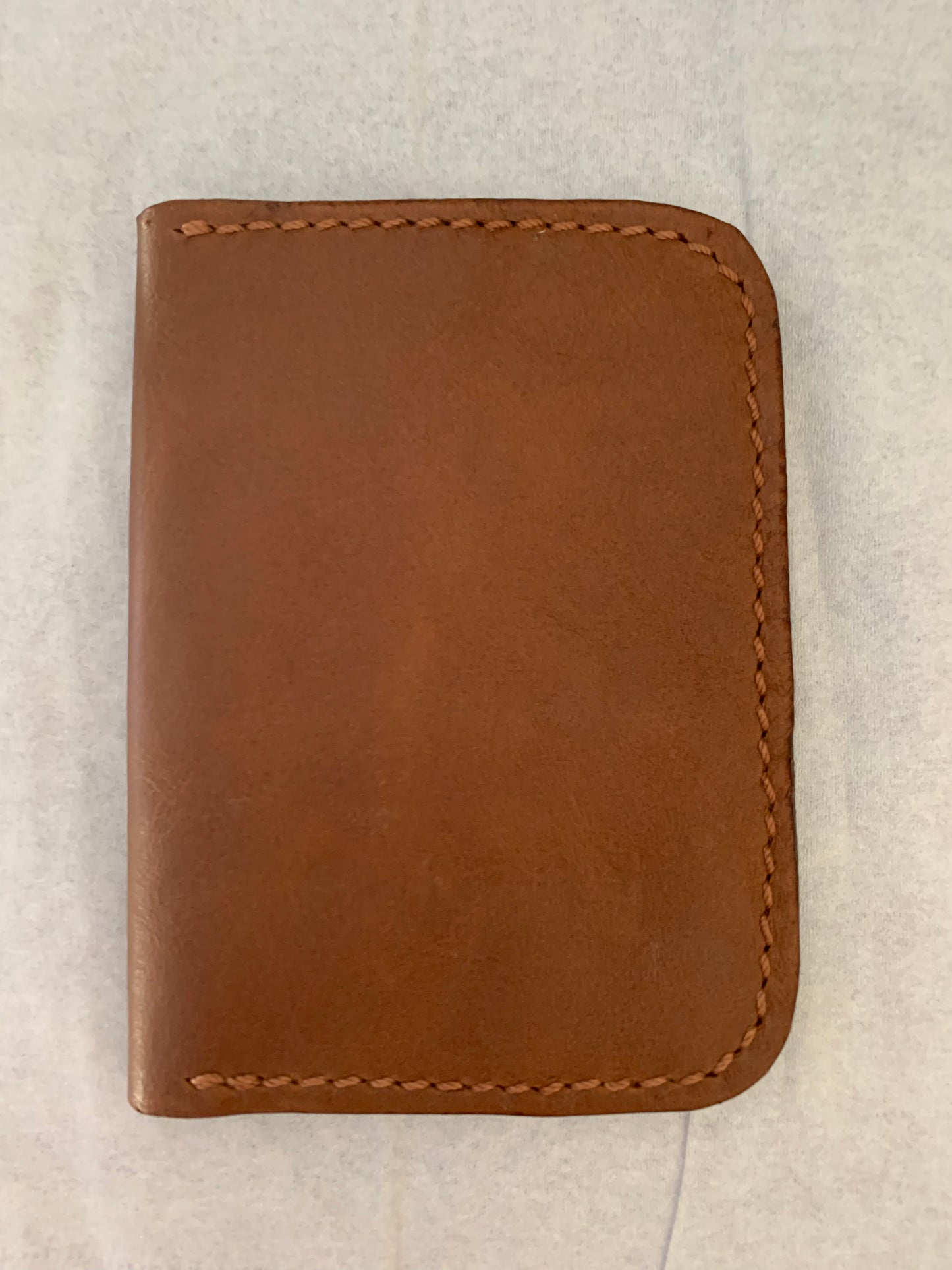 Brown and light green card wallet