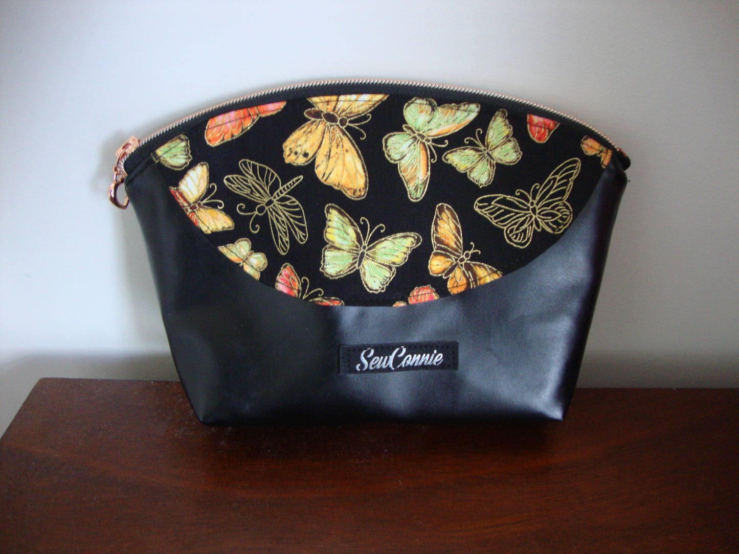 Orange butterfly with black vinyl make up pouch
