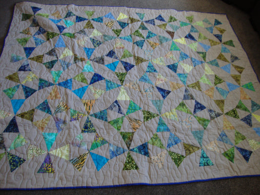 Triangle in a Circle Batik Quilt
