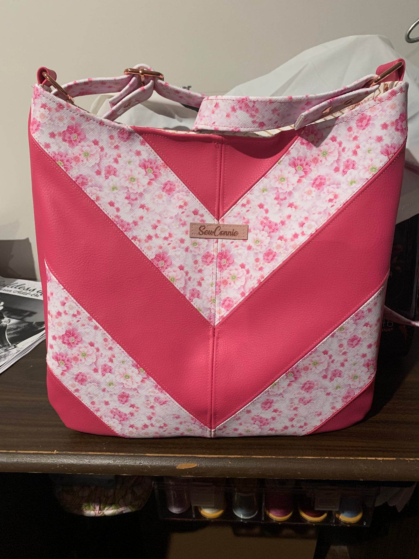 Pink flower with pink vinyl crossbody bag