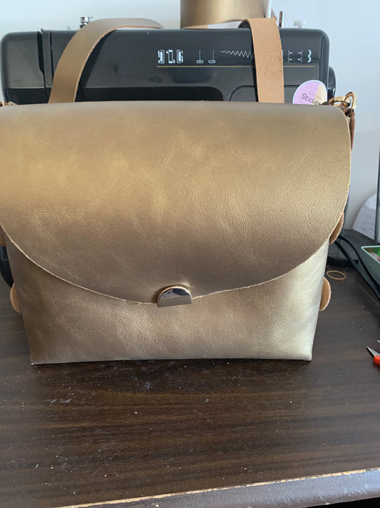 Metallic gold colour leather crossbody bag